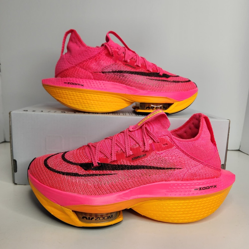 Nike Pink and Yellow Athletic Shoes